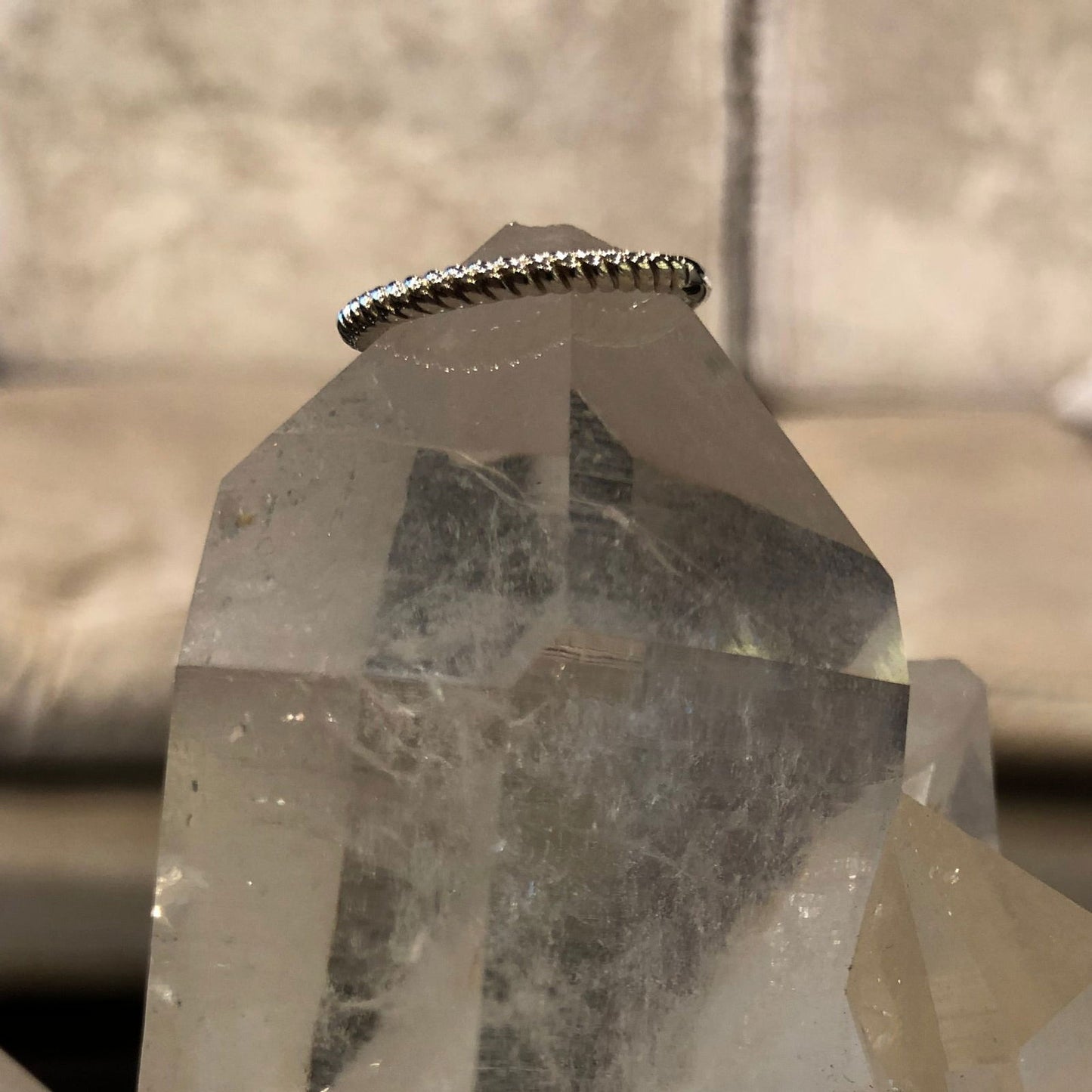 Photo of Ti Sento Sterling Silver Rope Ring in a decorative scene, designed by , available at Plumb Gold & Plumb Silver