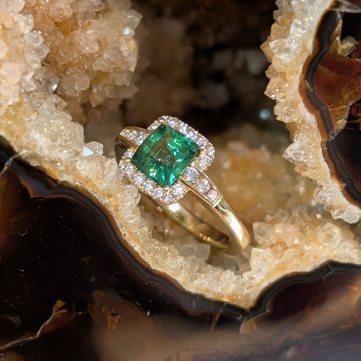 Photo of Tsavorite Halo Ring in a decorative scene, designed by , available at Plumb Gold & Plumb Silver