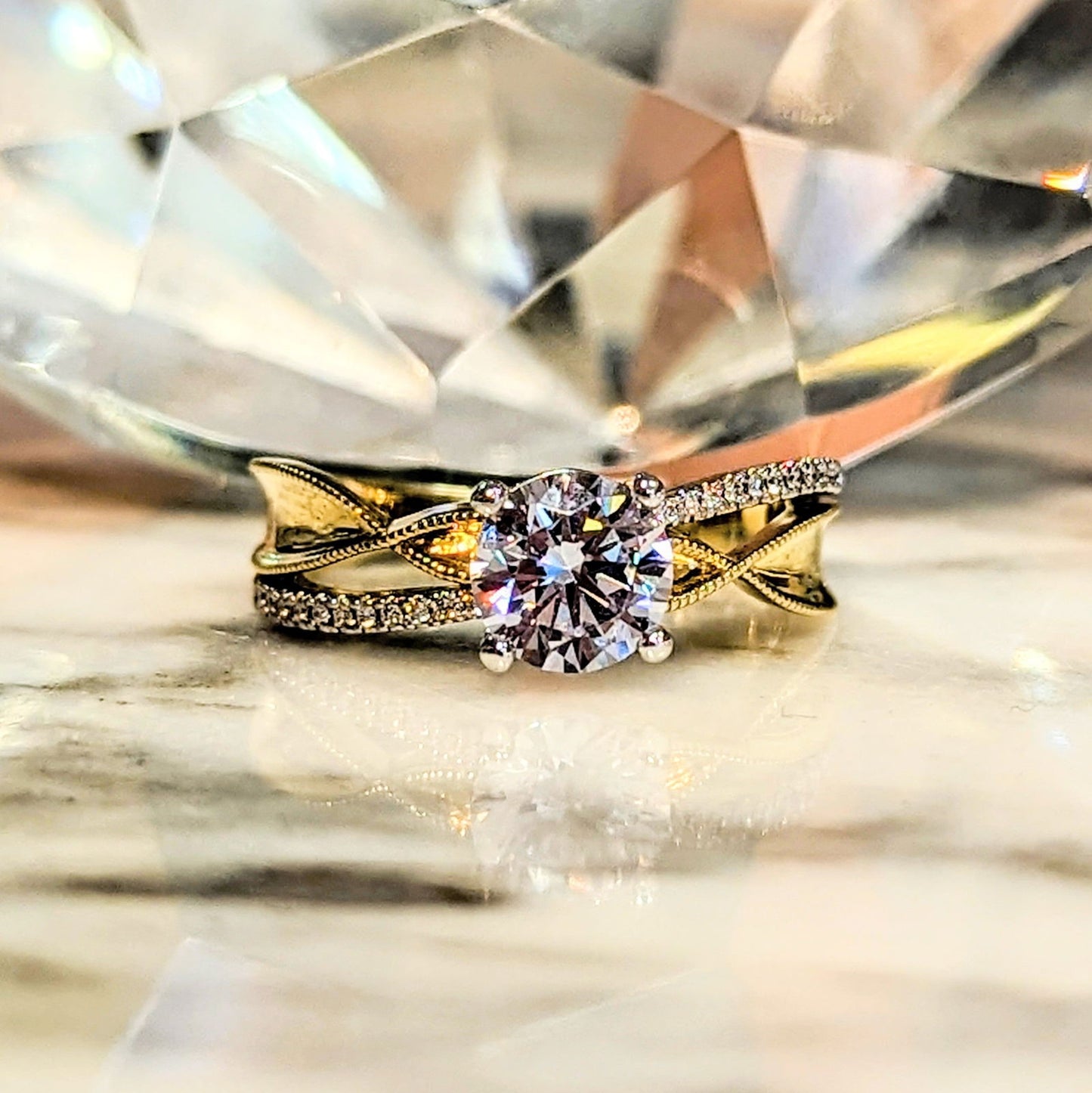 Photo of Twist Two-Tone Engagement Ring in a decorative scene, designed by , available at Plumb Gold & Plumb Silver