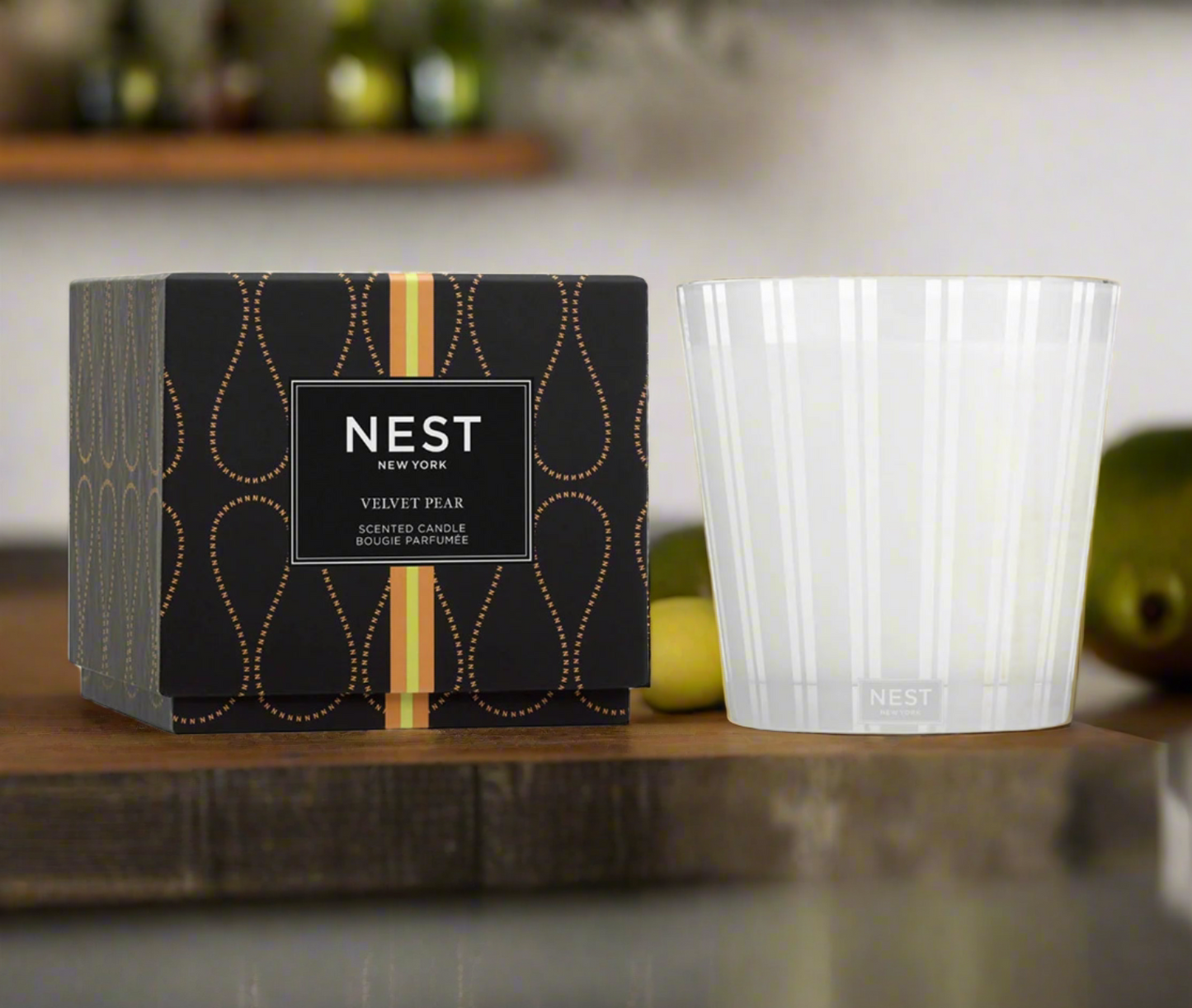 Photo of Velvet Pear Candle in a decorative scene, designed by , available at Plumb Gold & Plumb Silver