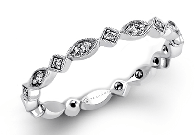 Photo of "Vera" Art Deco Band in a decorative scene, designed by , available at Plumb Gold & Plumb Silver