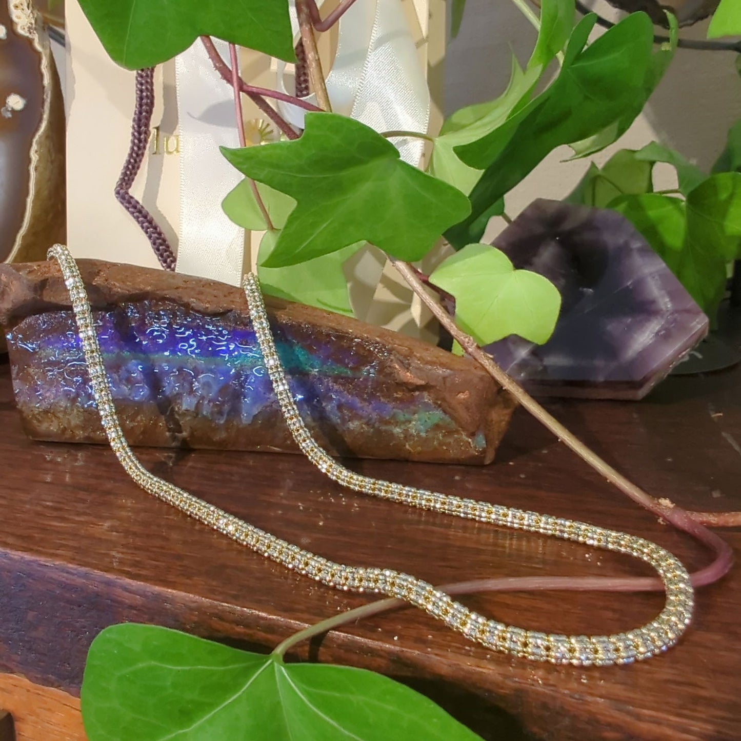 Photo of Vergano "Ice" Link Necklace in a decorative scene, designed by , available at Plumb Gold & Plumb Silver
