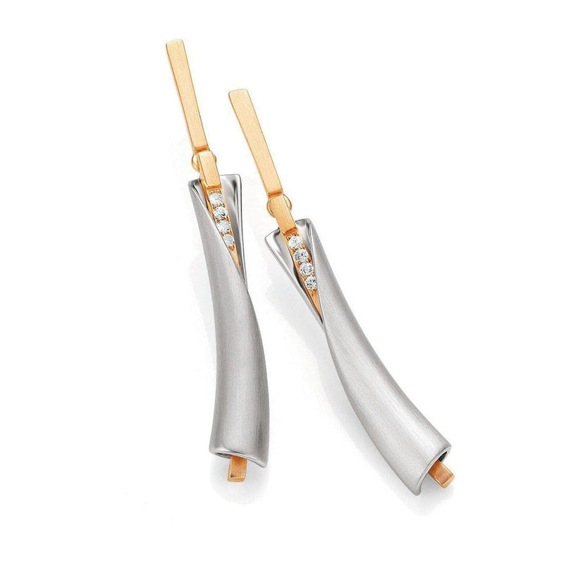 Photo of Wrap Dangles in a decorative scene, designed by , available at Plumb Gold & Plumb Silver
