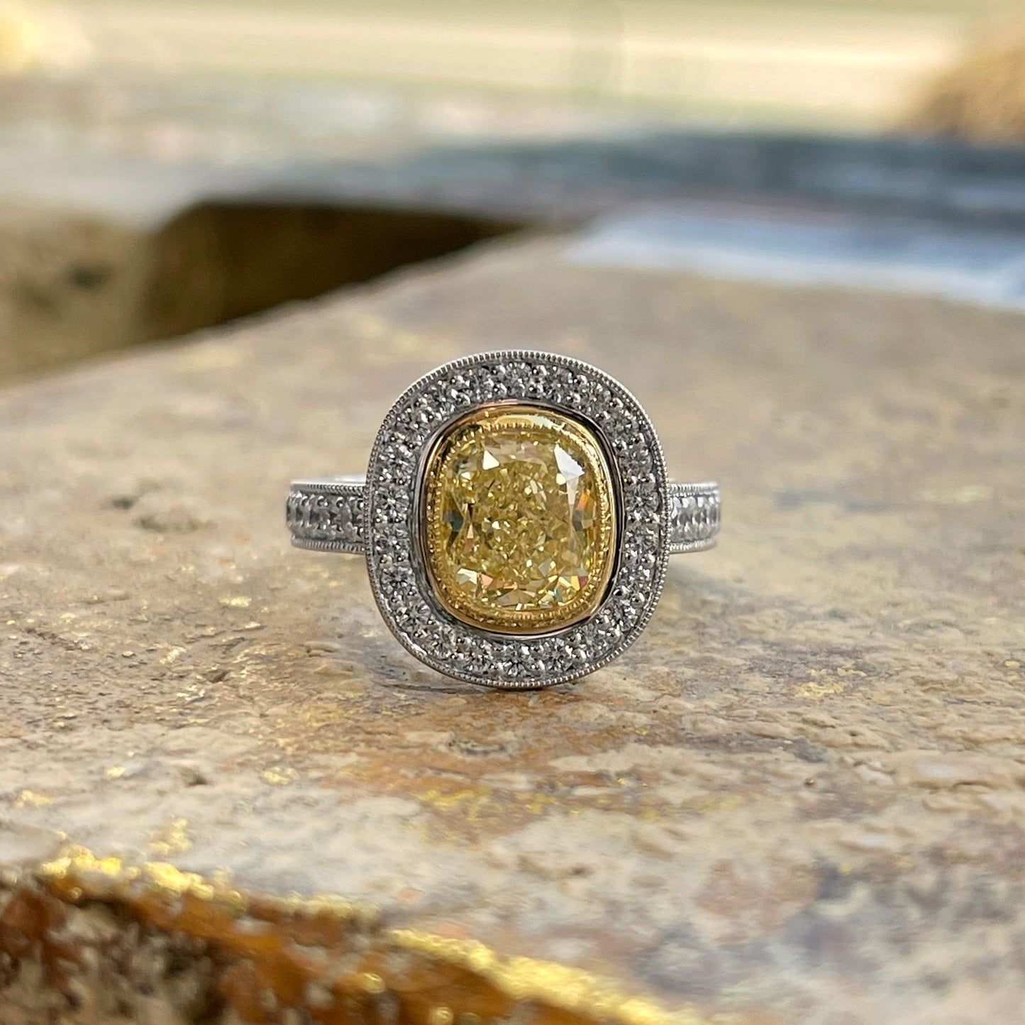 Photo of Yellow Diamond Ring in a decorative scene, designed by , available at Plumb Gold & Plumb Silver