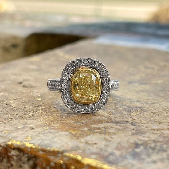 Photo of Yellow Diamond Ring in a decorative scene, designed by , available at Plumb Gold & Plumb Silver