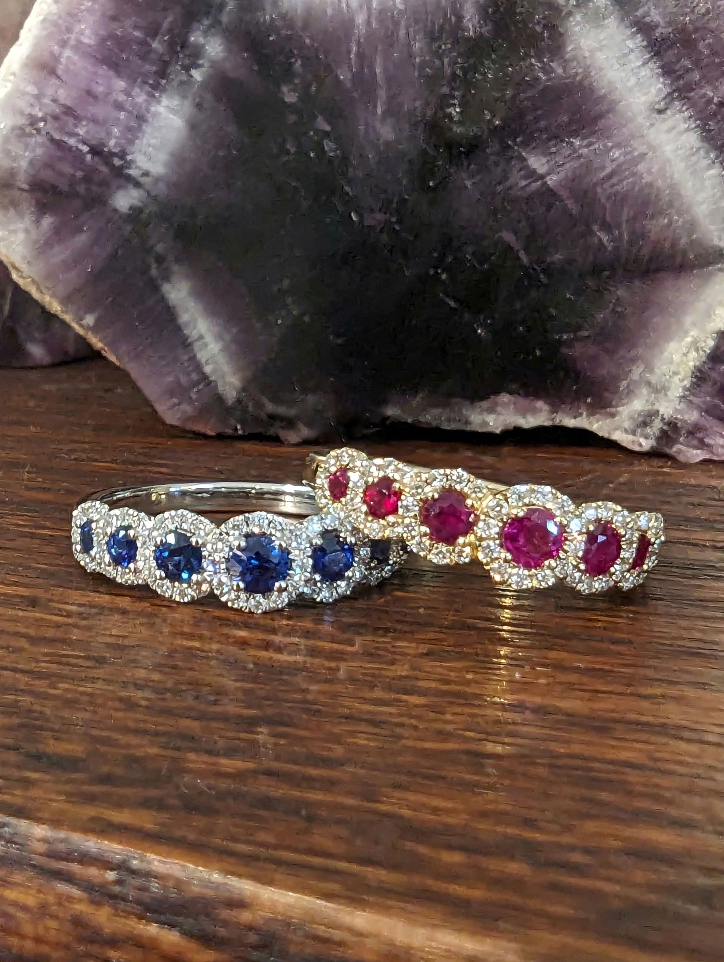 Photo of Zeghani Seven Halo Gemstone Ring in a decorative scene, designed by , available at Plumb Gold & Plumb Silver