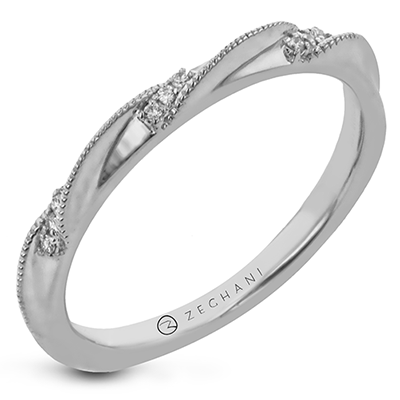Photo of Zeghani Twisted Diamond Band in a decorative scene, designed by , available at Plumb Gold & Plumb Silver