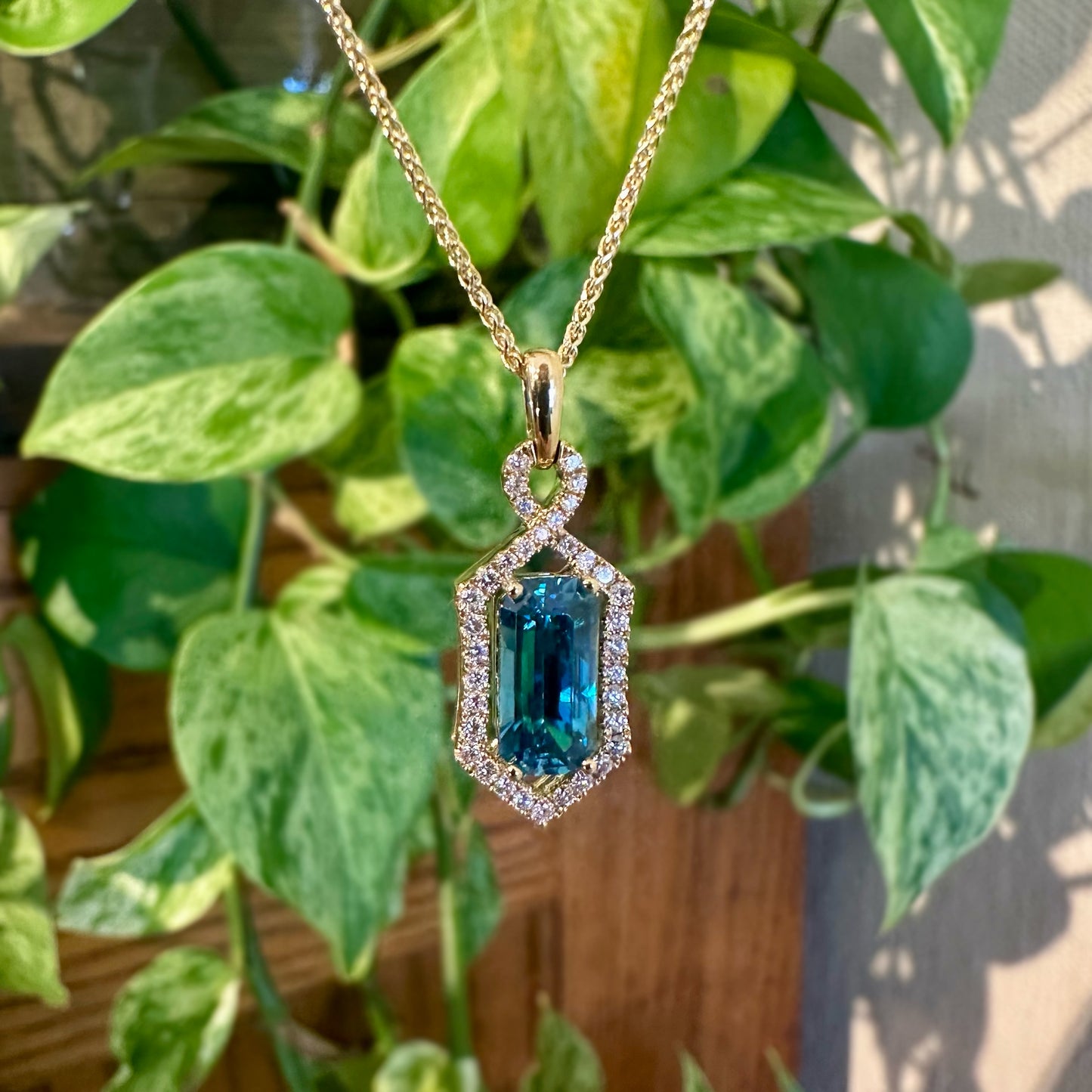 Zoma Blue Zircon Halo Pendant