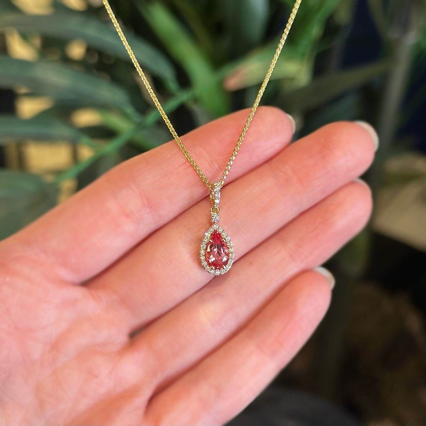Vibrant Peach Sapphire Halo Pendant