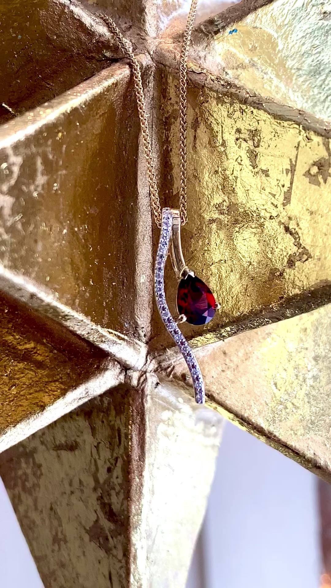 Load and play video in Gallery viewer, Red Garnet Swoop Pendant

